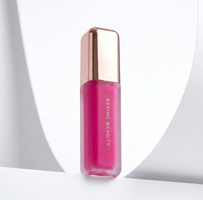 Refine Beauty blush with rose gold cap on a white background