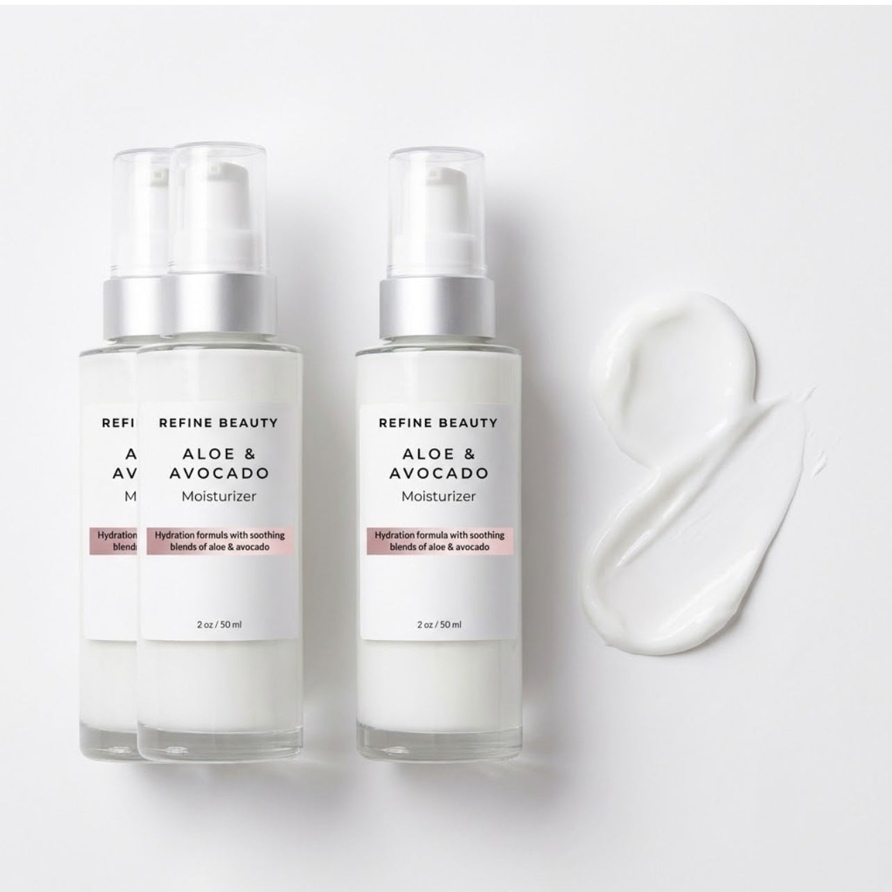 Two bottles of Aloe & Avocado Moisturizer by Refine Beauty on a white background with a smear of the product.