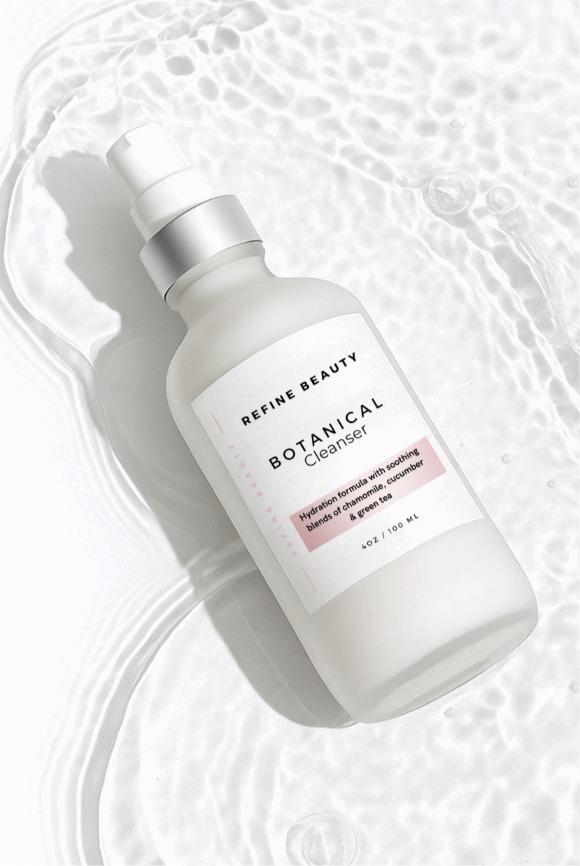 Refine Beauty Botanical cleanser laying on water 