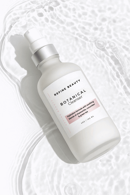 Refine Beauty Botanical cleanser laying on water 