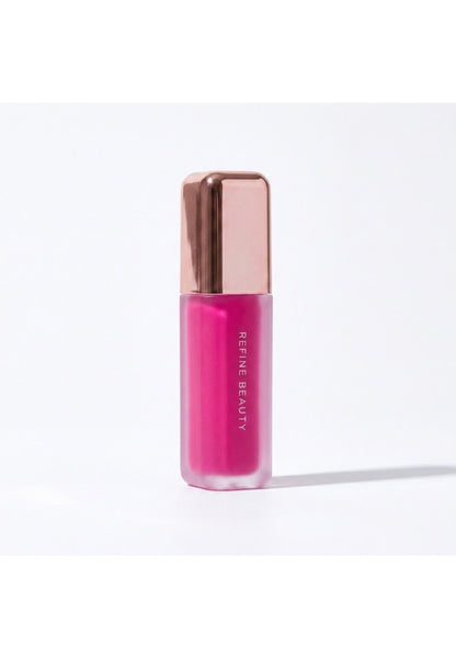 Refine Beauty blush with rose gold cap on a white background