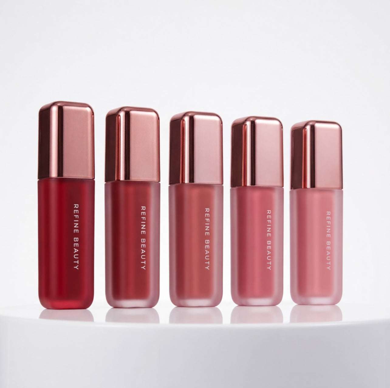 Refine Beauty liquid blush products on a white background