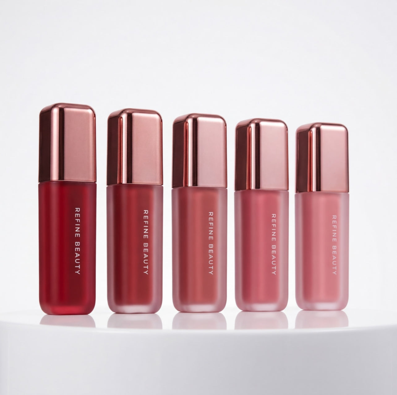 Refine Beauty liquid blush products on a white background