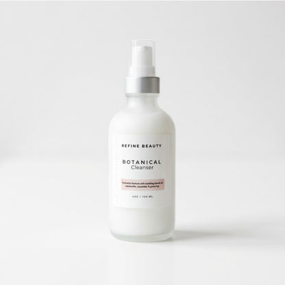 White bottle of Refine Beauty Botanical Cleanser on a white background