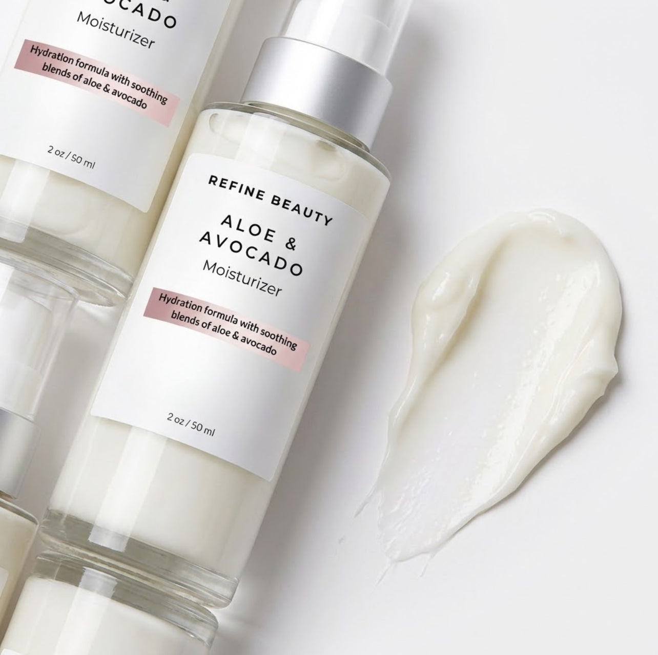 Refine Beauty Aloe and avocado moisturizer bottle with a swatch of cream on a white background