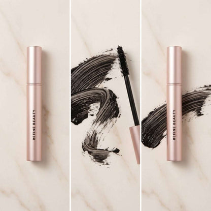  Refine Beauty Volume mascara  with brush on a marble background