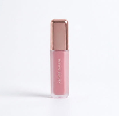 Refine Beauty blush with rose gold cap on a white background with rose gold cap on a white background