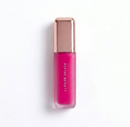 Refine Beauty blush with rose gold cap on a white background 