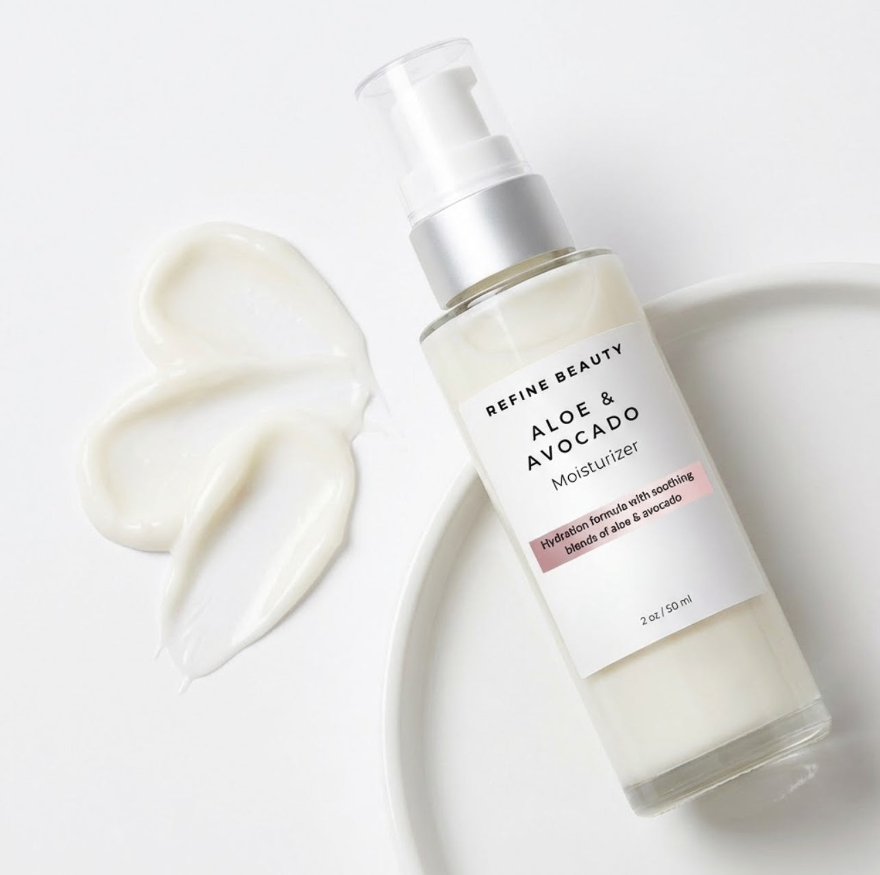Bottle of Refine Beauty Aloe & Avocado Moisturizer on a white background