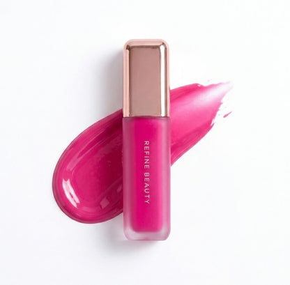 Refine Beauty blush with rose gold cap on a white background