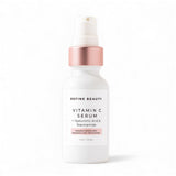 Refine Beauty Vitamin C serum bottle with rose gold cap on a white background