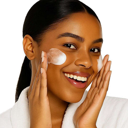 Refine Beauty model touching face while using the Botanical Cleanser texture