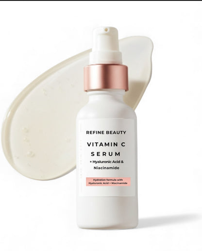 Vitamin C serum bottle with rose gold cap on a white background