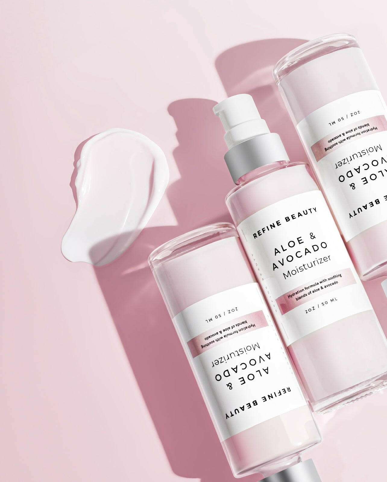 Three bottles of Aloe & Avocado Moisturizer for improved tone and texture and smooth skin