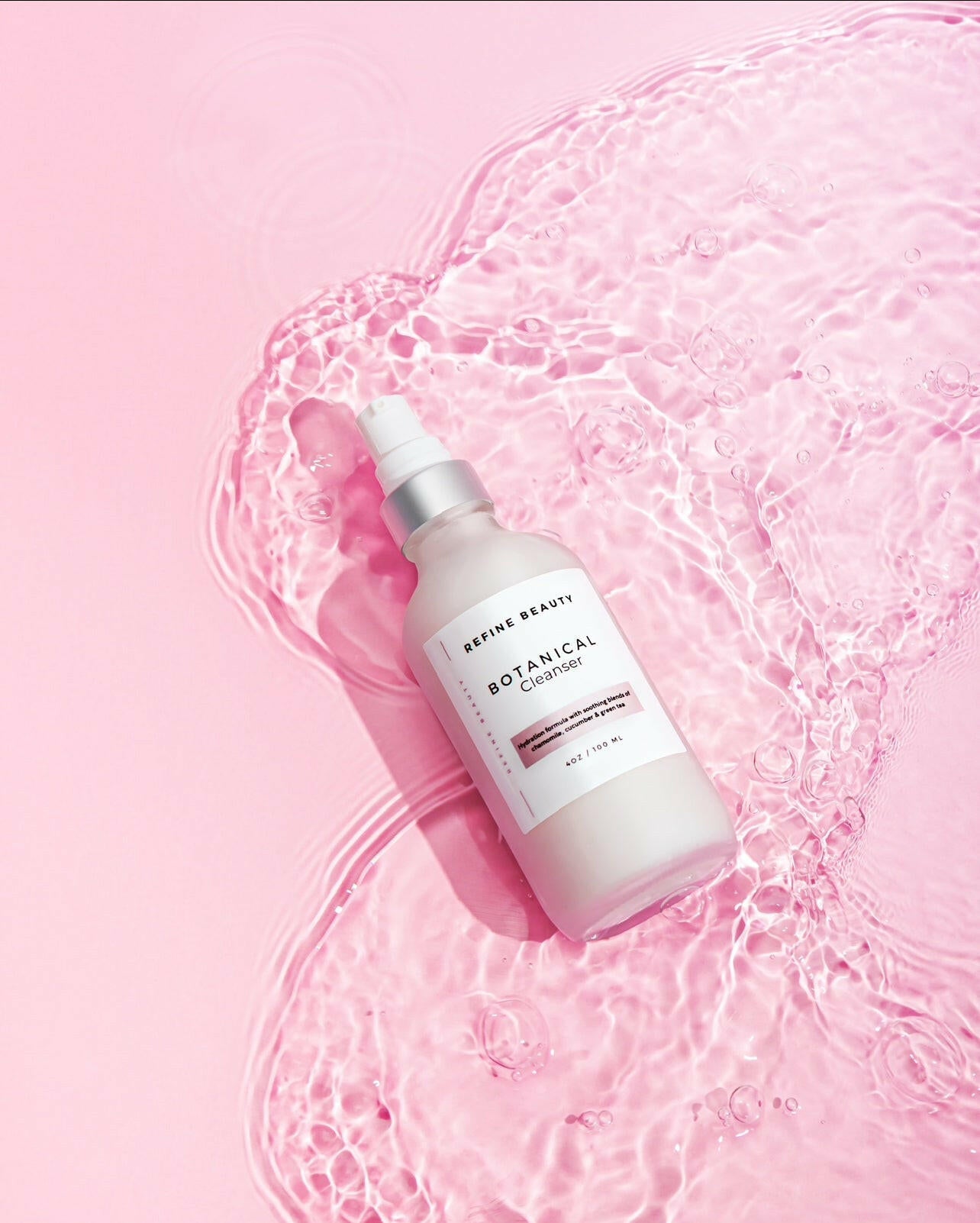 Botanical cleanser has natural ingredients like Chamomile, Aloe, Cucumber, and Japanese Green Tea extracts to nourish and fortify the skin with their antioxidant benefits; bottle on top of water 
