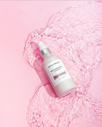 Botanical cleanser has natural ingredients like Chamomile, Aloe, Cucumber, and Japanese Green Tea extracts to nourish and fortify the skin with their antioxidant benefits; bottle on top of water 