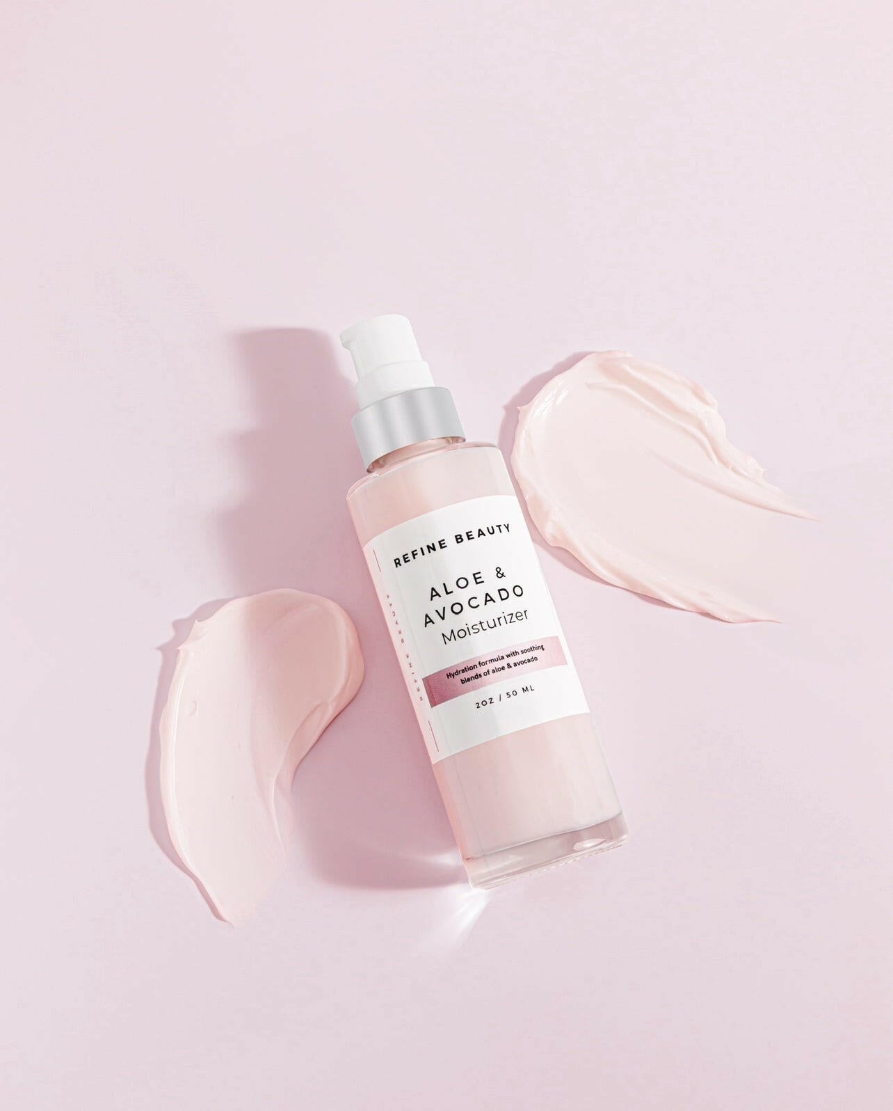 Aloe & Avocado Moisturizer for improved tone and texture and smooth skin with a texture pink swatch